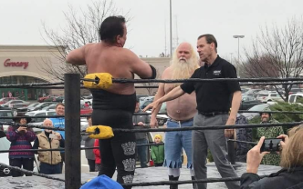 Jerry Lawler Wrestles in the Rain at His Restaurant