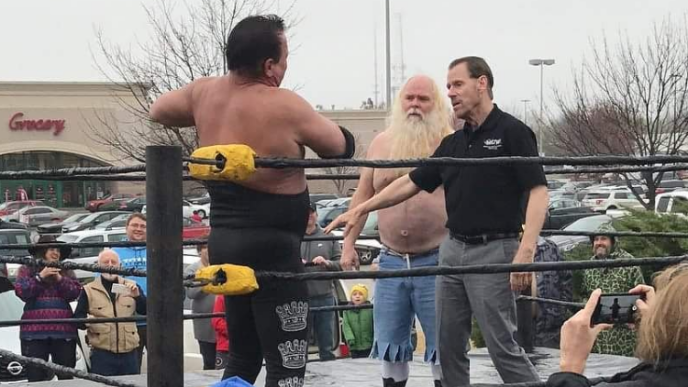 Jerry Lawler Wrestles in the Rain at His Restaurant
