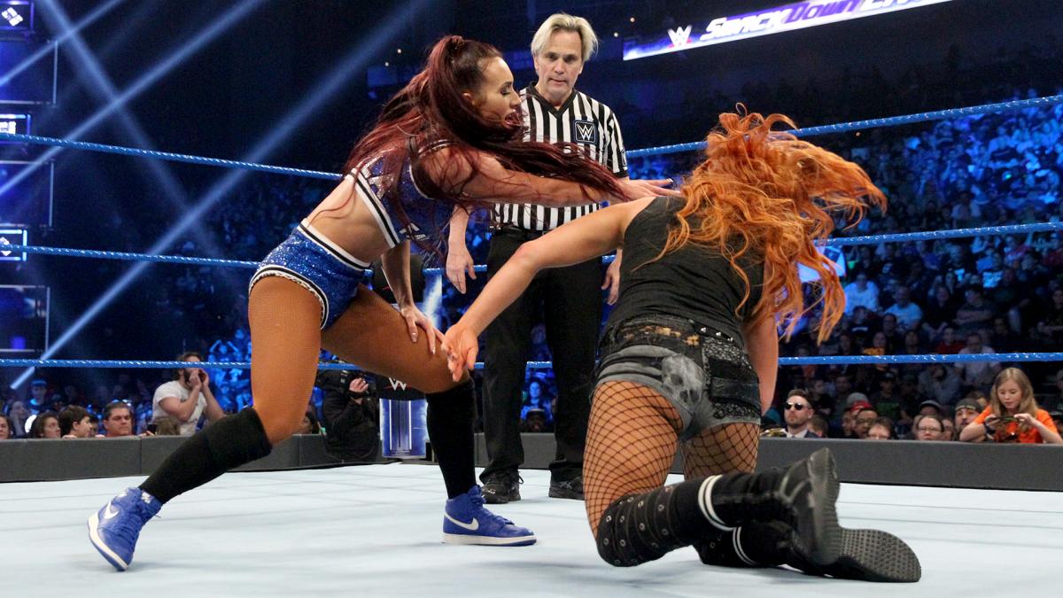 Becky Lynch def. Charlotte Flair and Carmella to earn the right to challenge SmackDown Women’s Champion Asuka at Royal Rumble