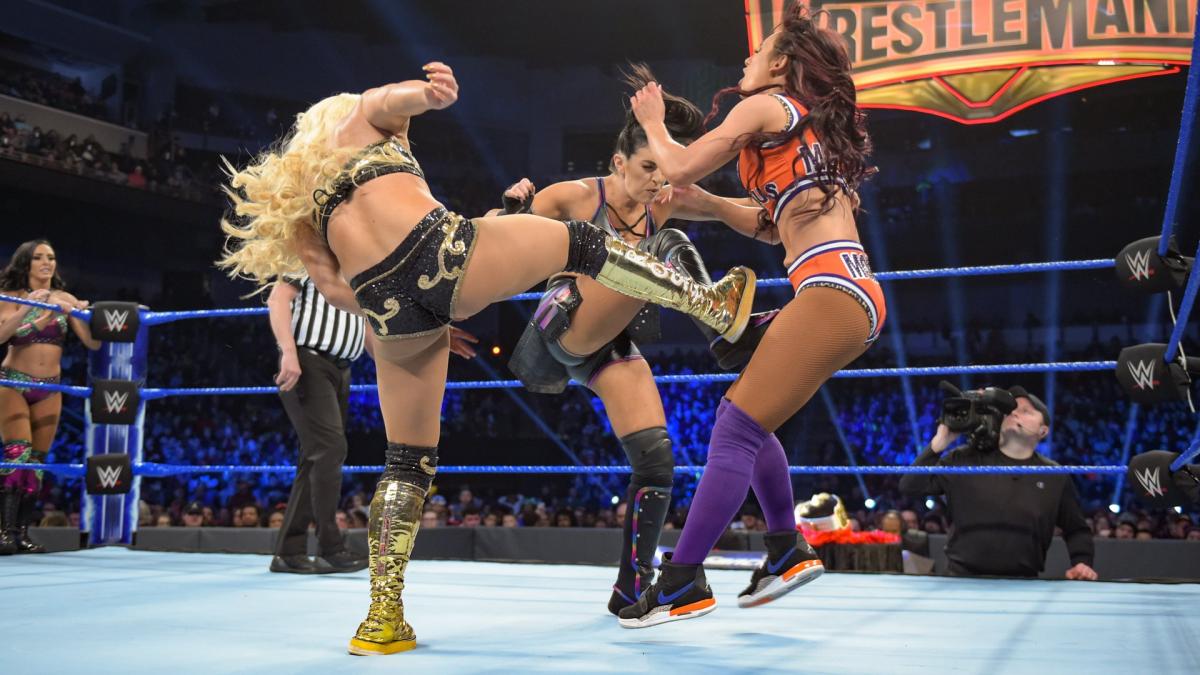 Naomi & Carmella def. Mandy Rose & Sonya Deville and The IIconics – Rose & Deville enter first in the Elimination Chamber Match