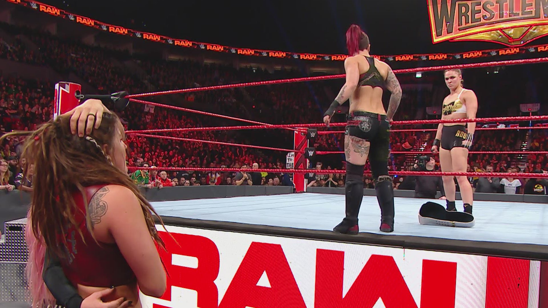 Raw Women’s Champion Ronda Rousey def. Liv Morgan and Sarah Logan