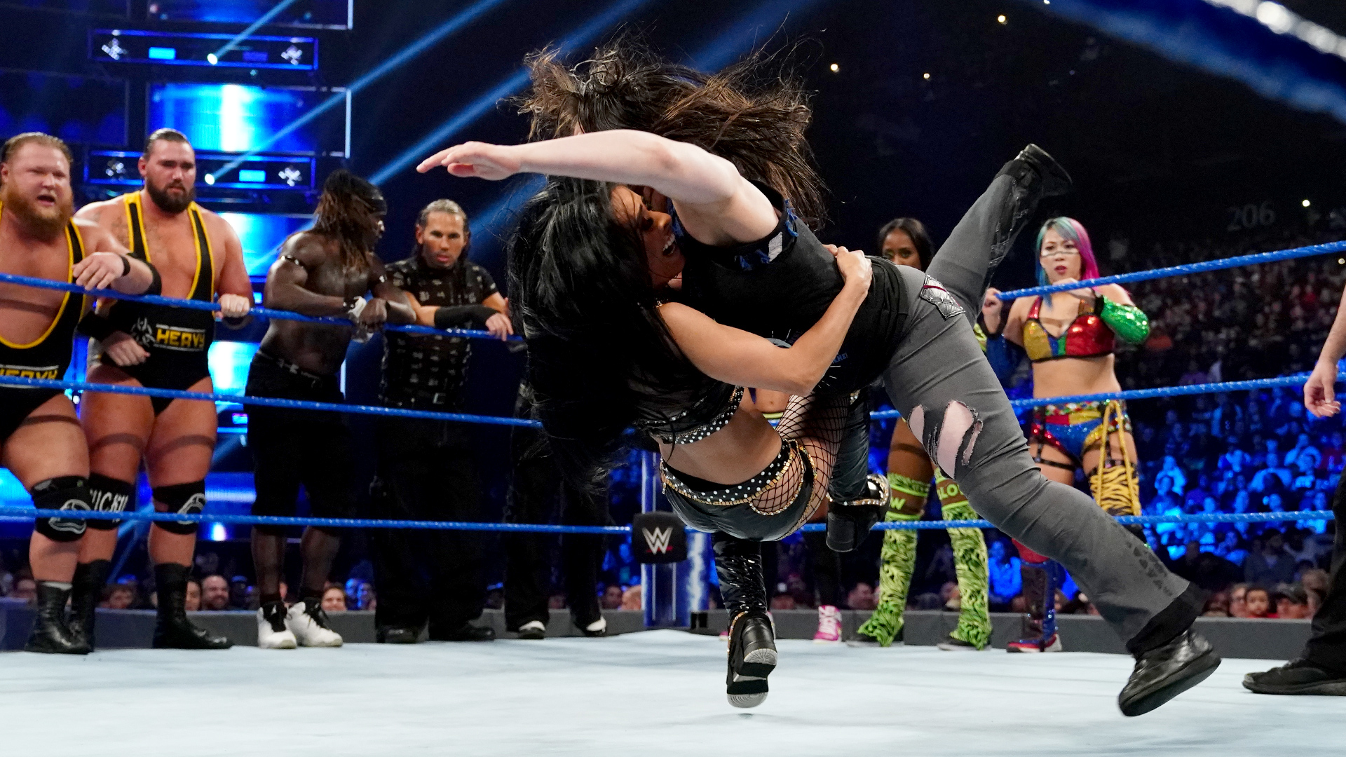 Chaos broke out in 18-Person Mixed Tag Team Match