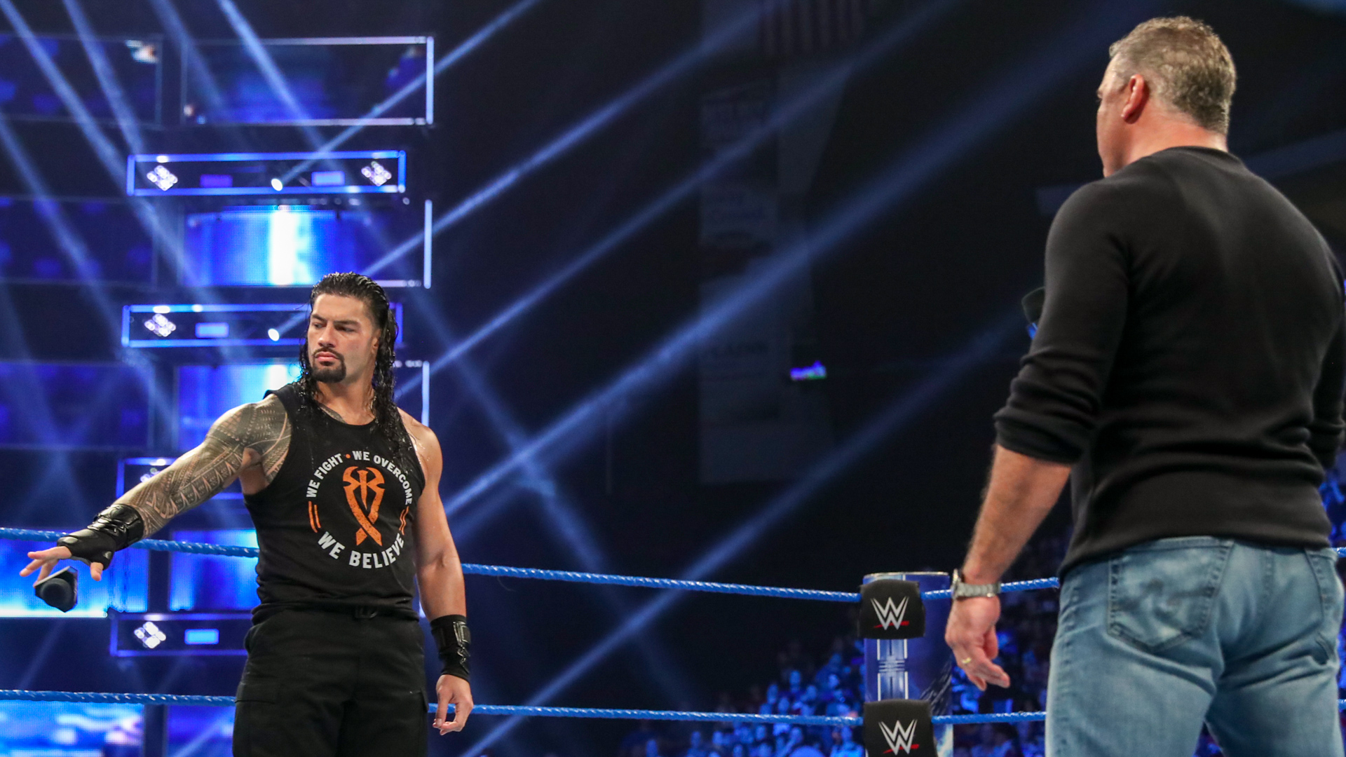 Elias and Shane McMahon brutally assaulted Roman Reigns