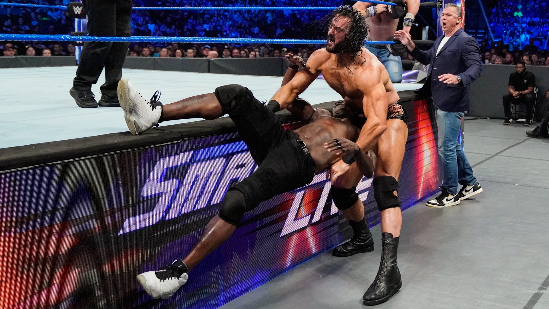 Roman Reigns & R-Truth def. Drew McIntyre & Elias; R-Truth def. Elias for the 24/7 Championship