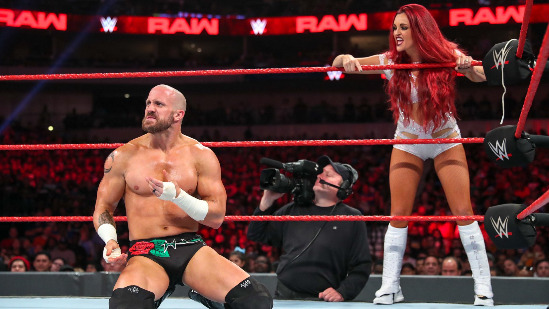 Universal Champion Seth Rollins & Raw Women’s Champion Becky Lynch def. Mike Kanellis & Maria Kanellis