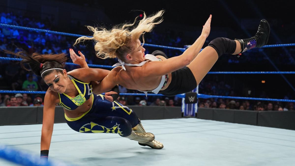 Bayley def. Lacey Evans as Charlotte Flair watched