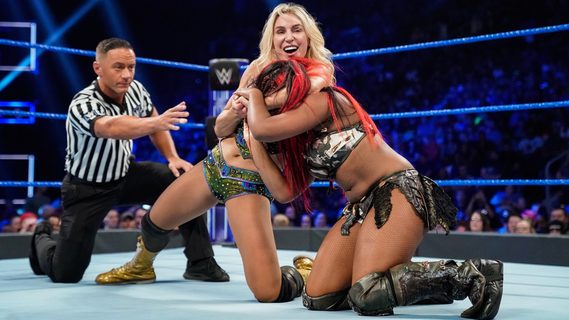 Charlotte Flair def. Ember Moon