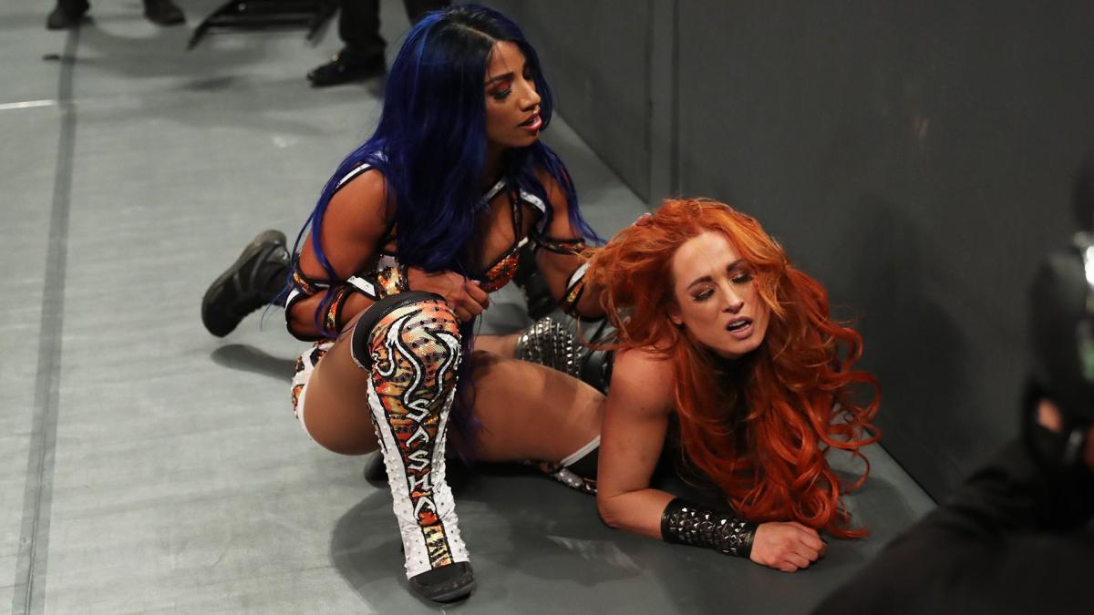 Sasha Banks returned and attacked Raw Women’s Champion Becky Lynch and Natalya