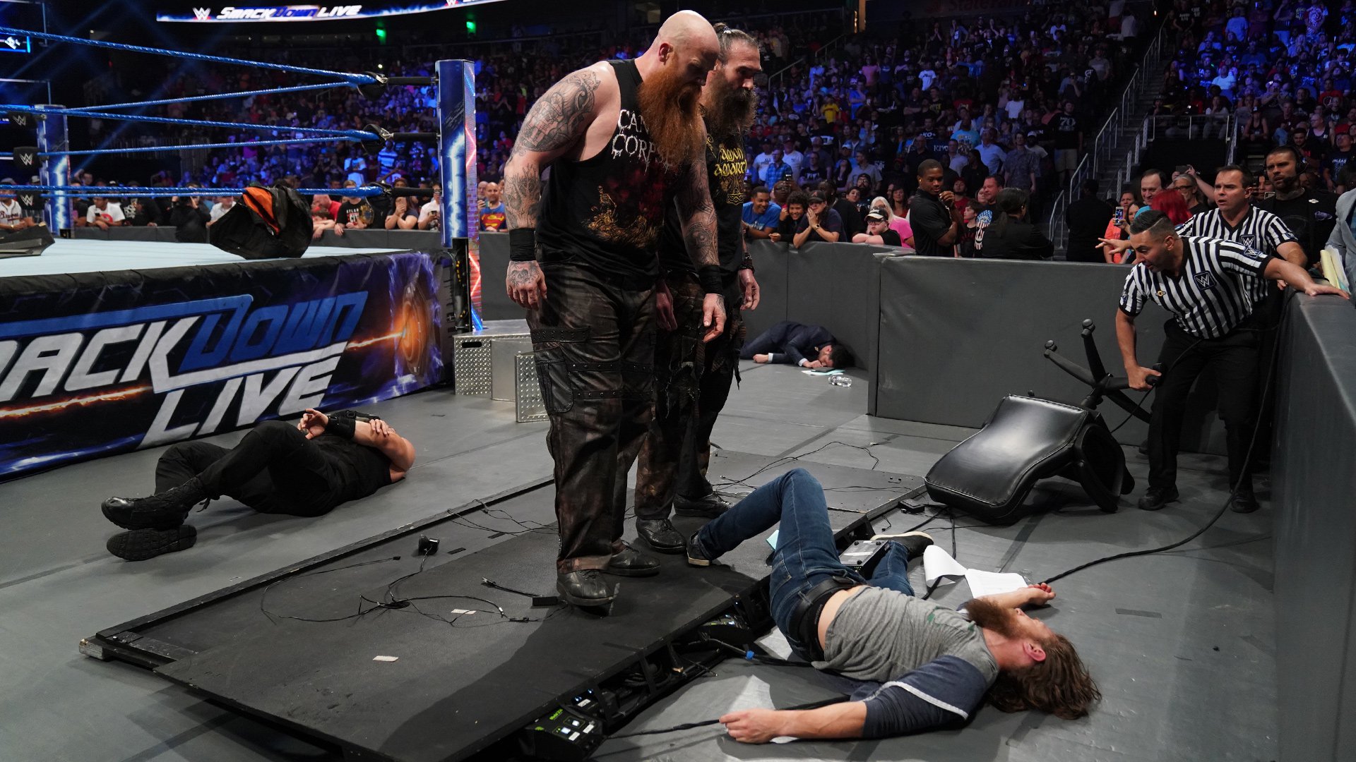 Erick Rowan & Luke Harper laid out Daniel Bryan and Roman Reigns