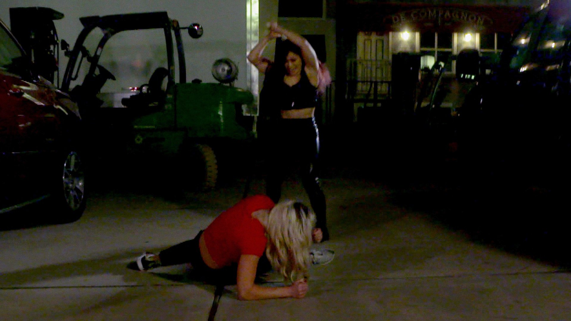 Io Shirai attacked Candice LeRae with a Kendo stick in the parking lot