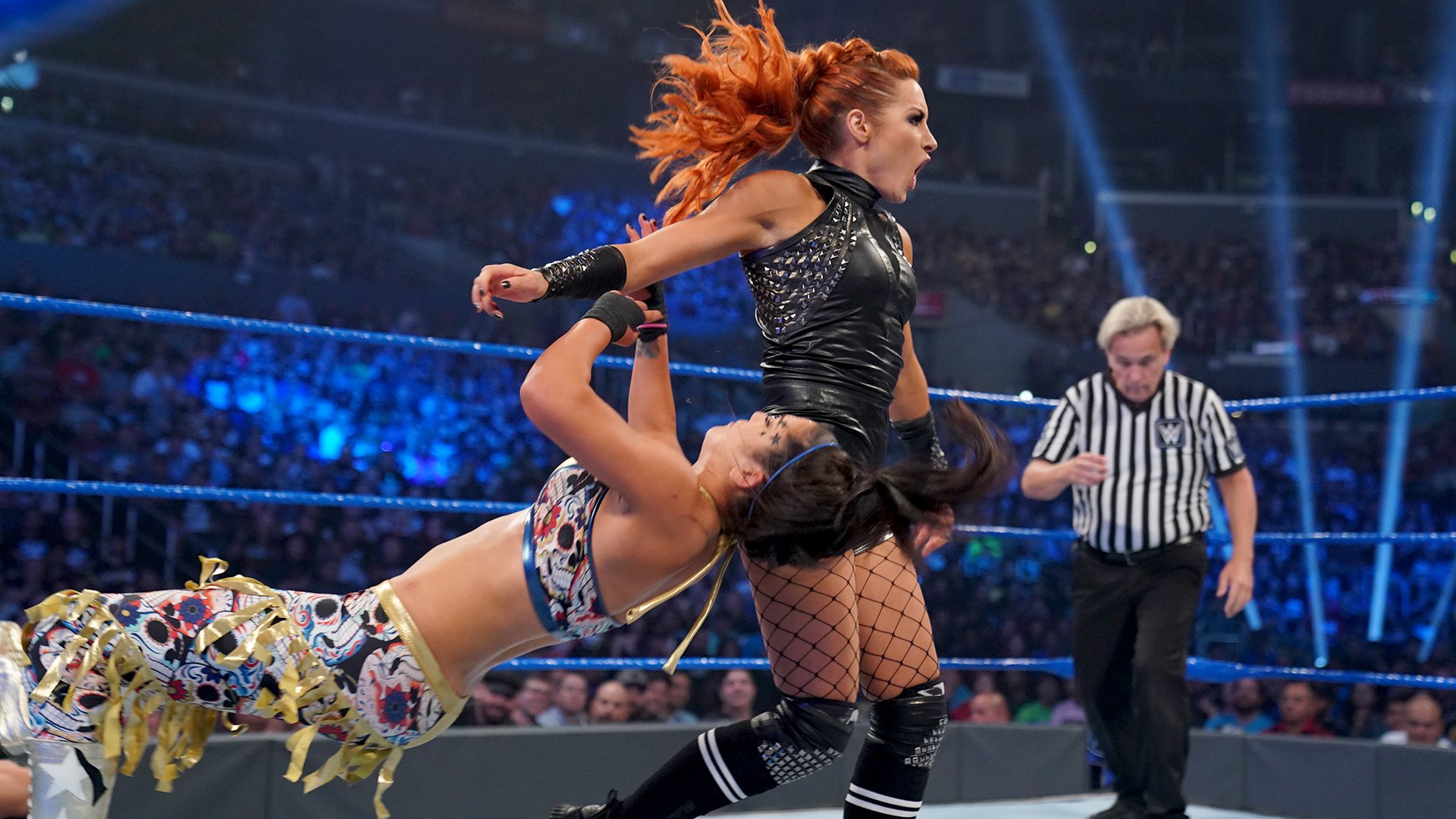 Becky Lynch & Charlotte Flair def. Bayley & Sasha Banks