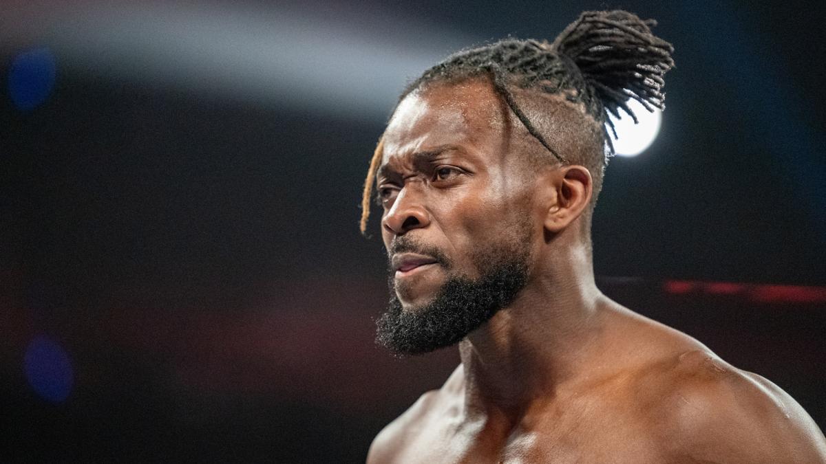 WWE Superstars lift up Kofi Kingston after defeat