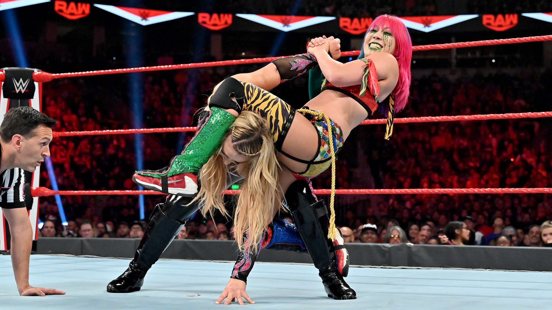 WWE Women’s Tag Team Champions The Kabuki Warriors def. Natalya & Lacey Evans