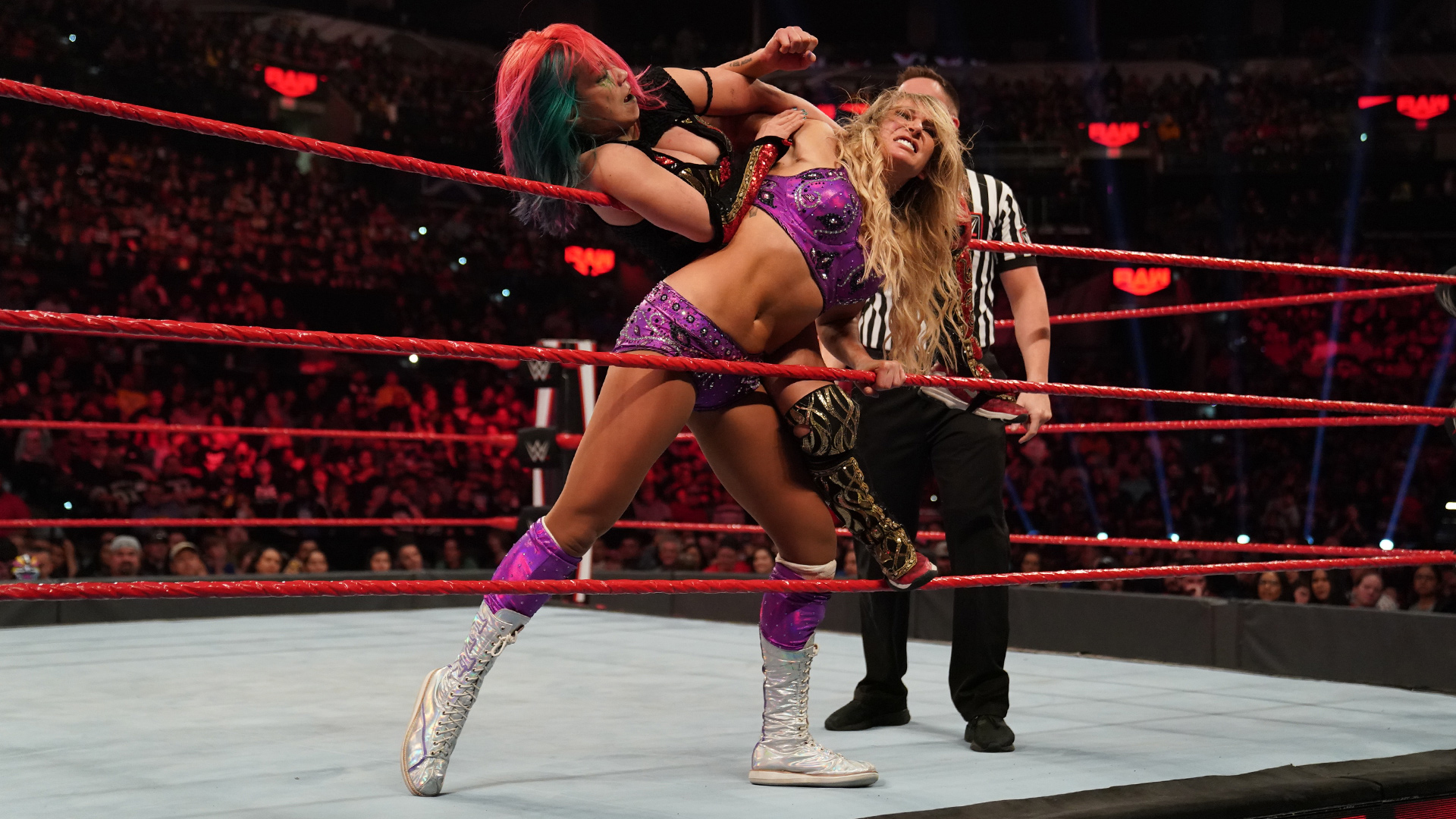 Charlotte Flair def. WWE Women’s Tag Team Champion Asuka via Disqualification