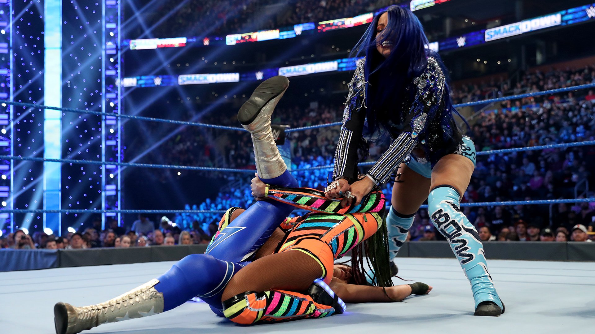 Naomi def. Bayley by disqualification