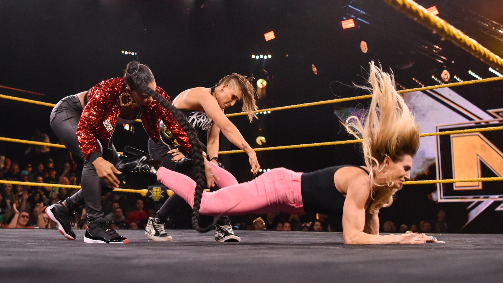 NXT Women’s Champion Rhea Ripley and Bianca Belair took out Charlotte Flair