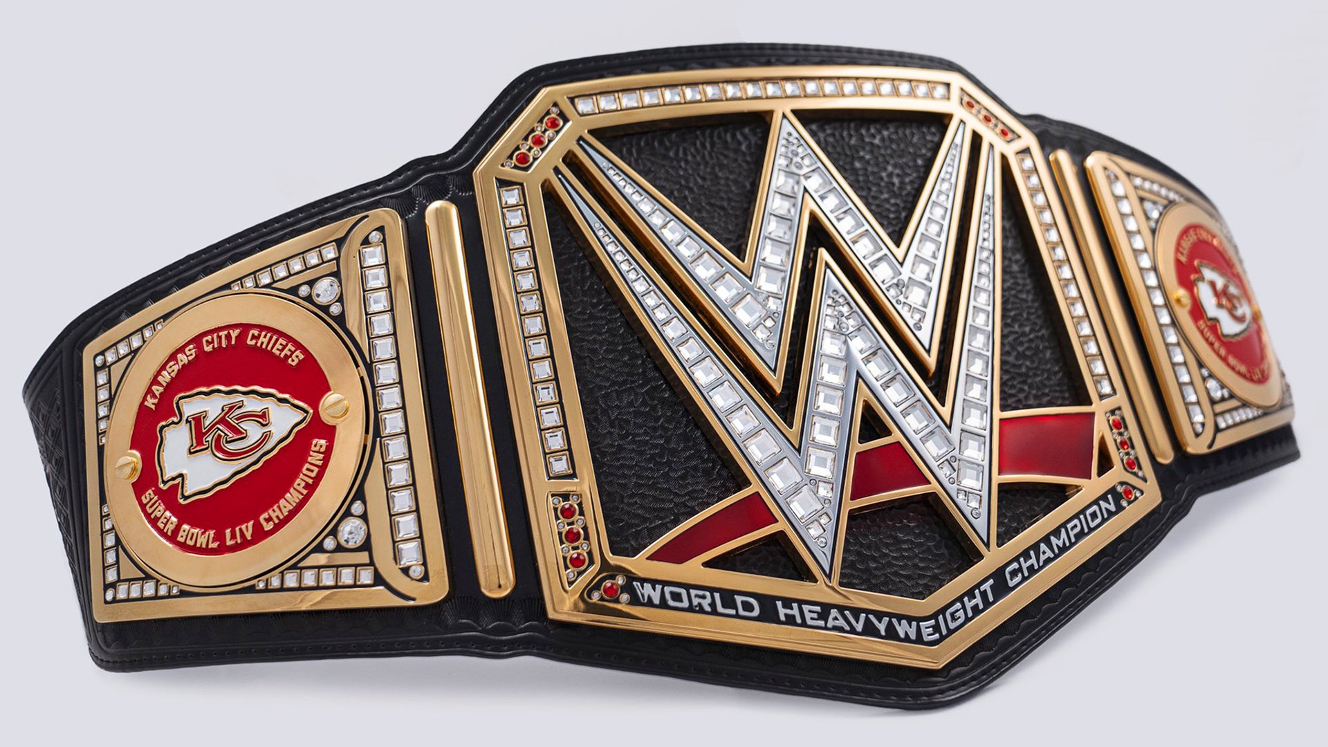 Super Bowl MVP Patrick Mahomes shows off the Kansas City Chiefs’ custom WWE Championship