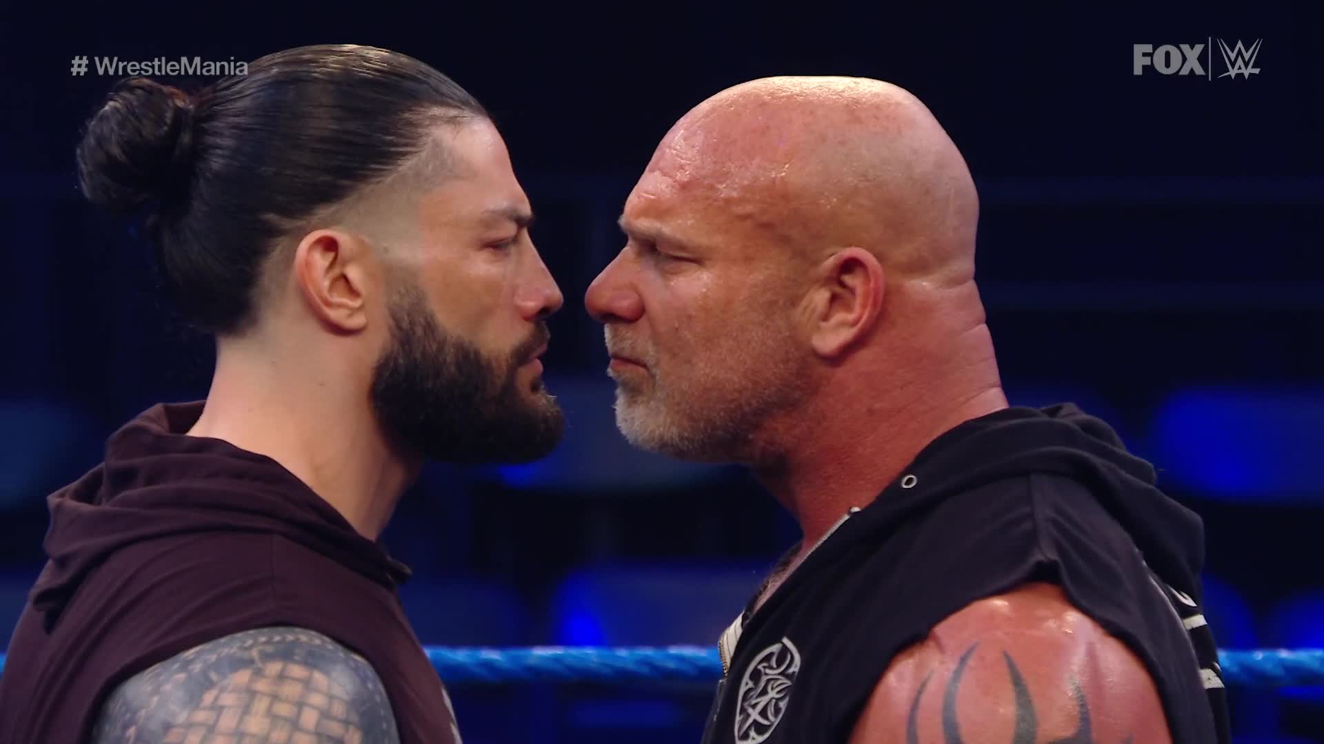 Goldberg and Roman Reigns nearly come to blows after signing their WrestleMania contract