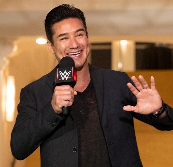 Mario Lopez and family channel WWE Superstars for Halloween