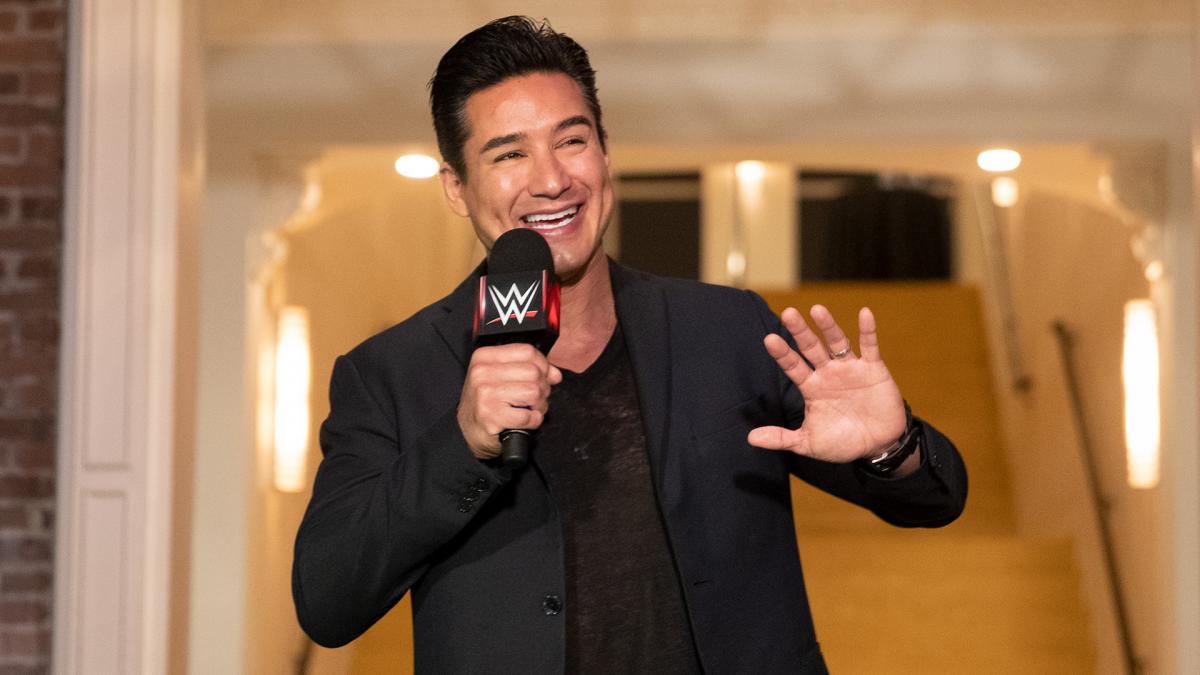 Mario Lopez and family channel WWE Superstars for Halloween