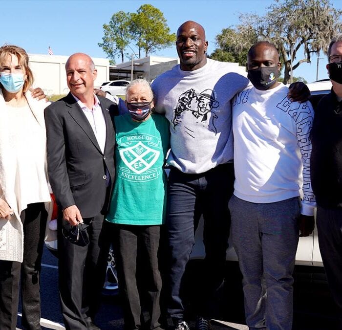 Titus O’Neil surprises families in need with cars for the holidays