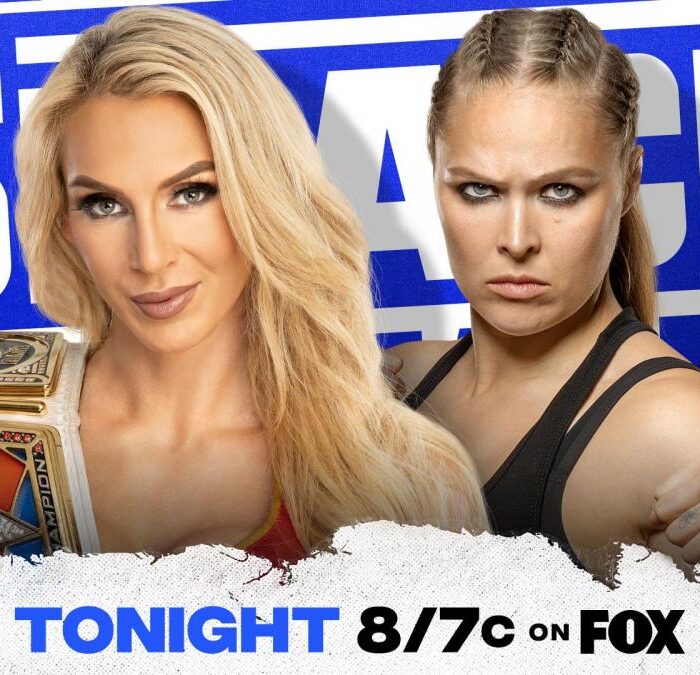 Charlotte Flair and Ronda Rousey sign the contract for their “I Quit” Match