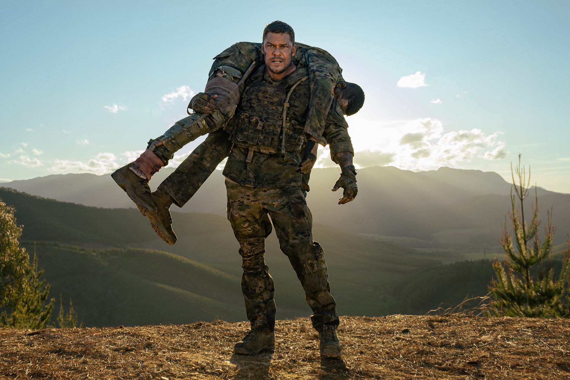 Alan Ritchson as 81 and Stephan James as 7 in War Machine.