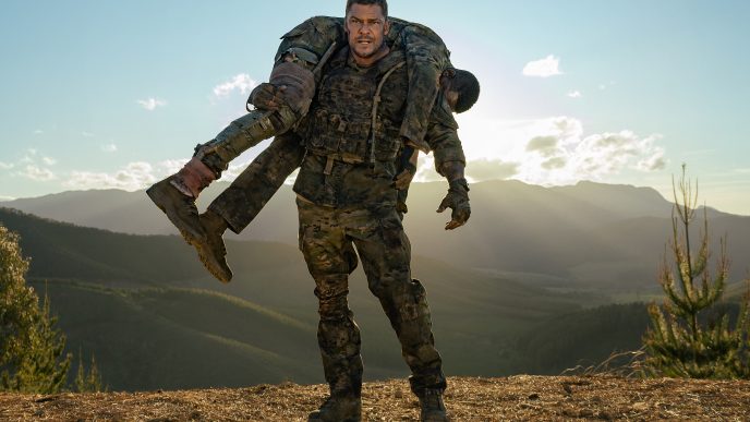 Alan Ritchson as 81 and Stephan James as 7 in War Machine.