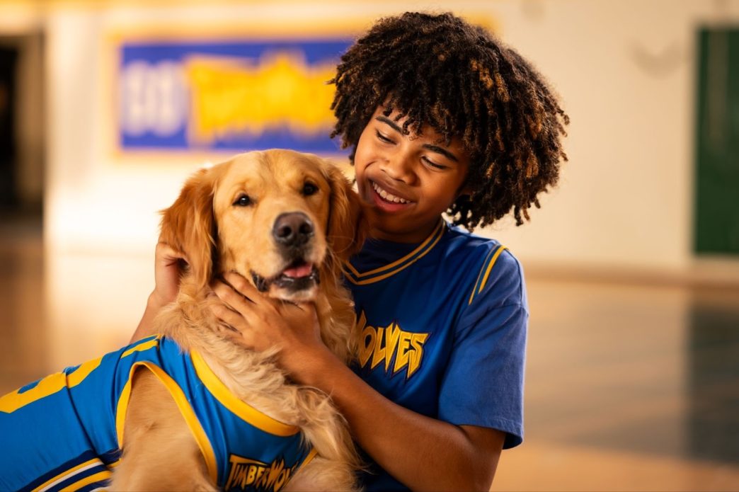 Air Bud at CinemaCon Barco event promoting Air Bud Returns with basketball setup