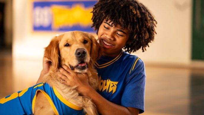 Air Bud at CinemaCon Barco event promoting Air Bud Returns with basketball setup