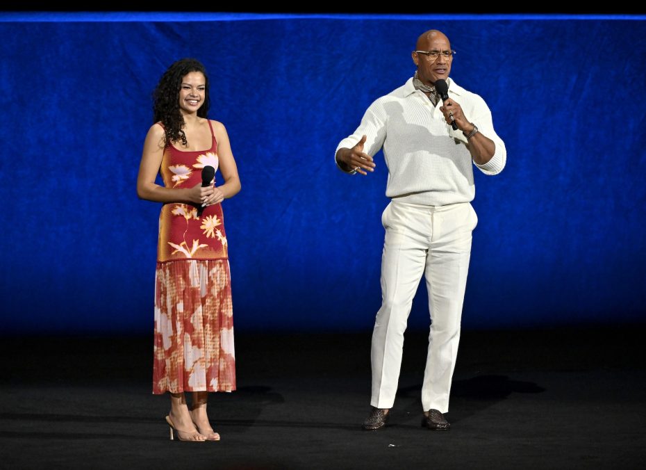 LAS VEGAS, NEVADA - APRIL 16: (L-R) Catherine Laga'aia and Dwayne Johnson speak during CinemaCon 2026 - Walt Disney Studios Invites you to its 2026 presentation highlighting its upcoming release schedule at The Dolby Colosseum at Caesars Palace during CinemaCon, the official convention of Cinema United, on April 16, 2026, in Las Vegas, Nevada. (Photo by David Becker/Getty Images for CinemaCon)