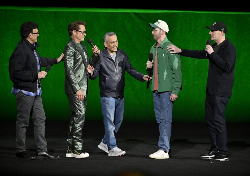 LAS VEGAS, NEVADA - APRIL 16: (L-R) Anthony Russo, Robert Downey Jr., Joe Russo, Chris Evans and Kevin Feige, President, Marvel Studios, speak during CinemaCon 2026 - Walt Disney Studios Invites you to its 2026 presentation highlighting its upcoming release schedule at The Dolby Colosseum at Caesars Palace during CinemaCon, the official convention of Cinema United, on April 16, 2026, in Las Vegas, Nevada. (Photo by David Becker/Getty Images for CinemaCon)