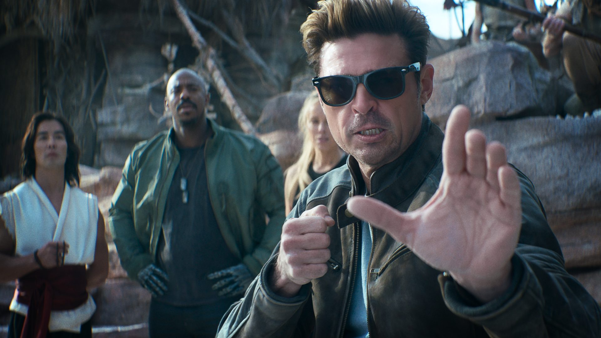Karl Urban as Johnny Cage in Mortal Kombat II (2026) standing in a combat arena ready for battle with dramatic lighting