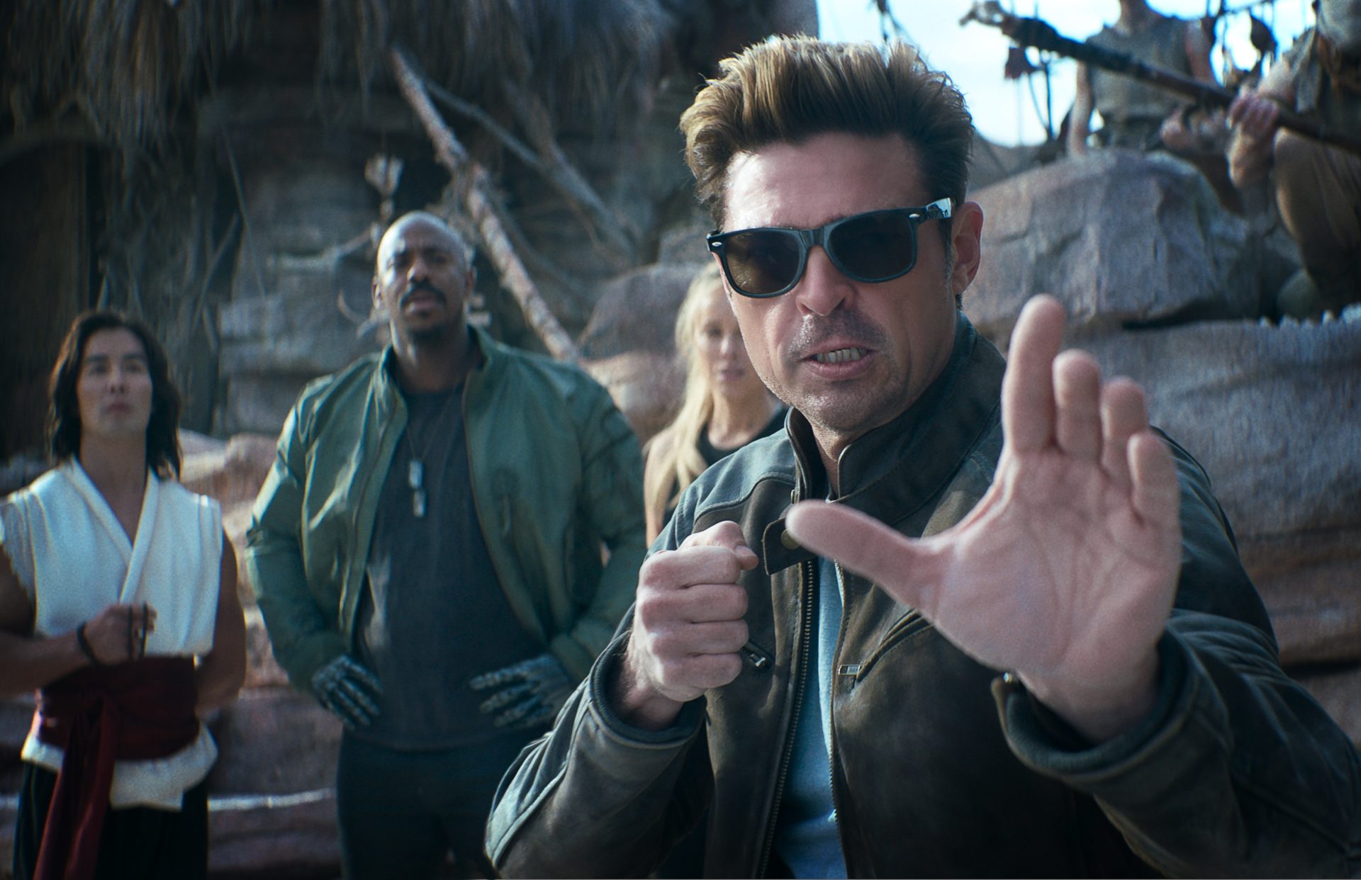 Karl Urban as Johnny Cage in Mortal Kombat II (2026) standing in a combat arena ready for battle with dramatic lighting