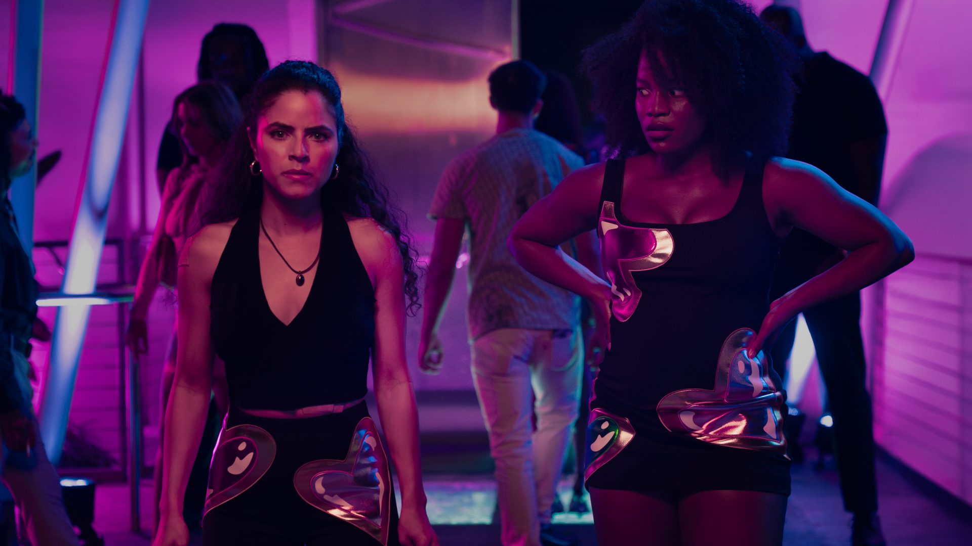 Shannon Gisela as Etta Tiger Jonze & Brittany Adebumola as Lovely in Peacock’s crime thriller series M.I.A.