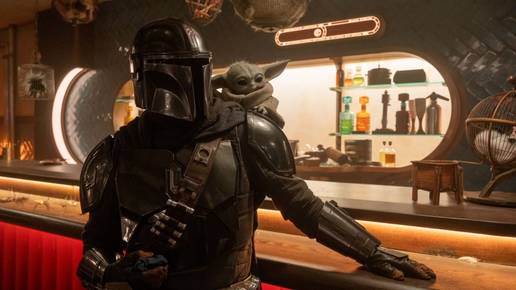 Pedro Pascal as Din Djarin alongside Grogu in Star Wars The Mandalorian and Grogu