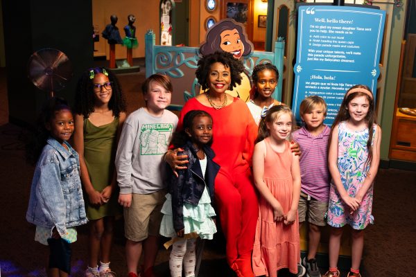 Jenifer Lewis visits Tiana's Joyful Celebration, the first museum exhibit dedicated to Disney's Princess Tiana.