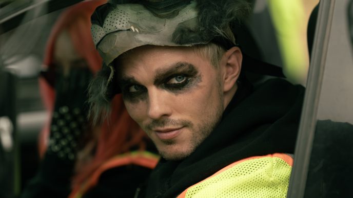 Nicholas Hoult in the first trailer for David Leitch's How to Rob a Bank.