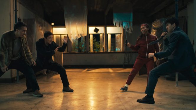 Xie Miao and Joe Taslim in The Furious during a high-intensity martial arts fight sequence.