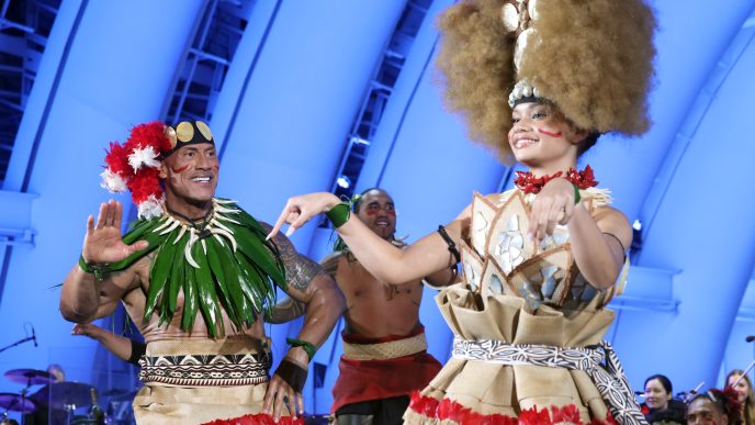 Dwayne Johnson and Catherine Lagaʻaia attend Disney’s Moana world premiere at the Hollywood Bowl in Los Angeles.