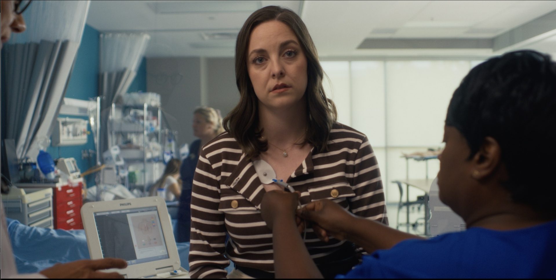 Brittany Curran stars as Julia Winters in The Christmas Heartbeat.