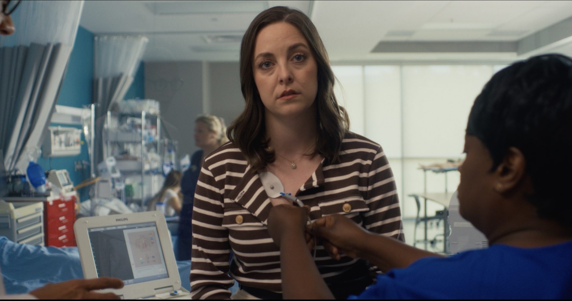 Brittany Curran stars as Julia Winters in The Christmas Heartbeat.