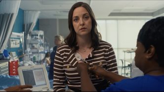 Brittany Curran stars as Julia Winters in The Christmas Heartbeat.